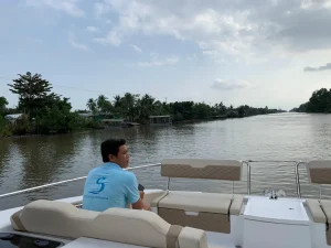 A guest on deck watching the river